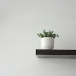 Boutique floating shelf toiletry presentation for Airbnb guests